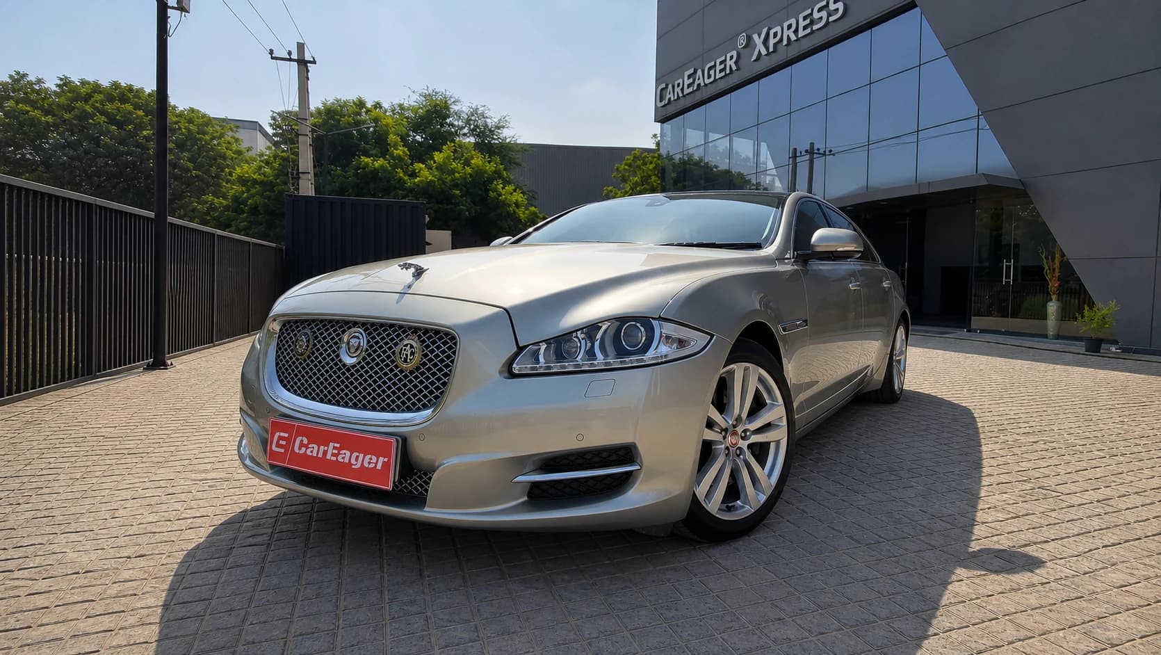 Silver Jaguar XJ outside the CarEager Xpress workshop